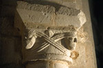 Capitel, two heads